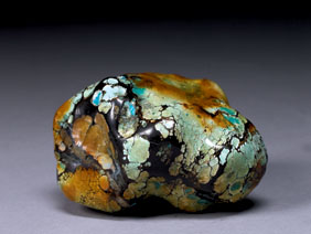 Appraisal: TURQUOISE NUGGET Hunan China This is a typical nugget of