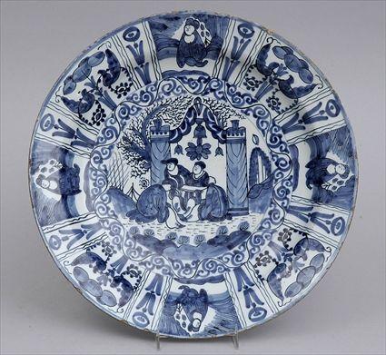 Appraisal: DUTCH DELFT BLUE AND WHITE CHARGER Centered by chinoiserie scholars