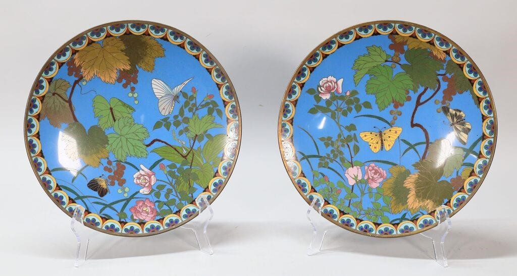 Appraisal: Pair of cloisonne chargers with butterfly and flower decoration Each