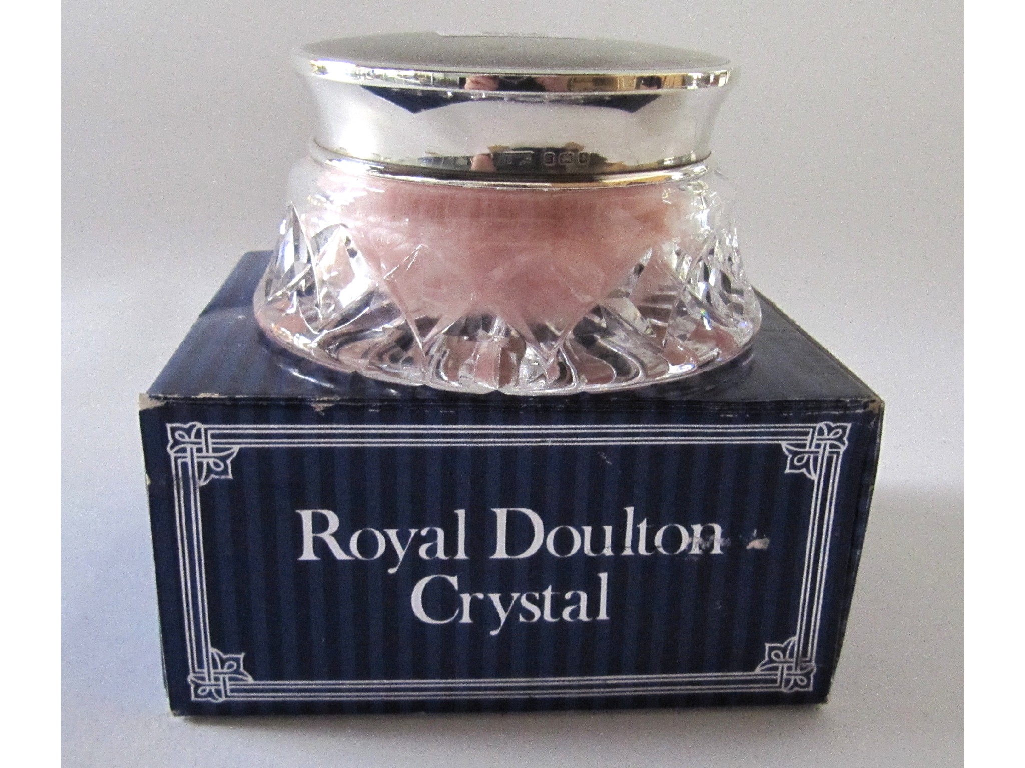 Appraisal: A silver topped Royal Doulton cut crystal talcum jar London