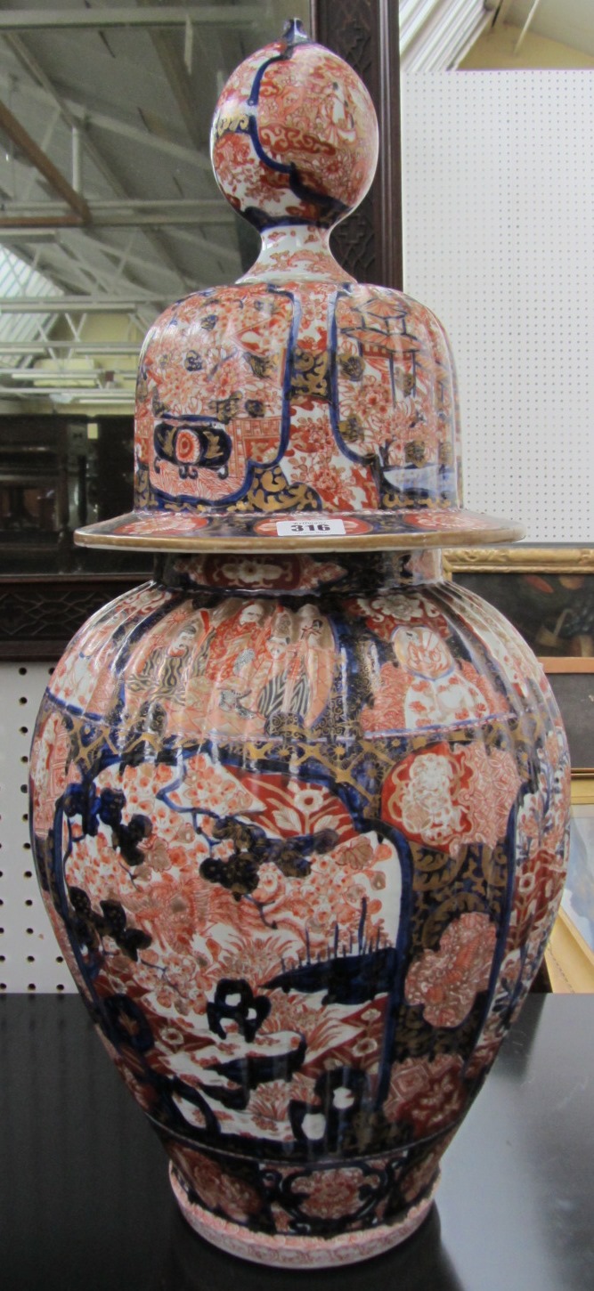 Appraisal: A large ribbed Japanese Imari ovoid vase and cover Meiji