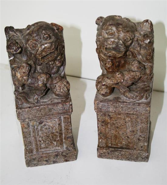 Appraisal: Pair Chinese carved soapstone bookends late th century seated foo