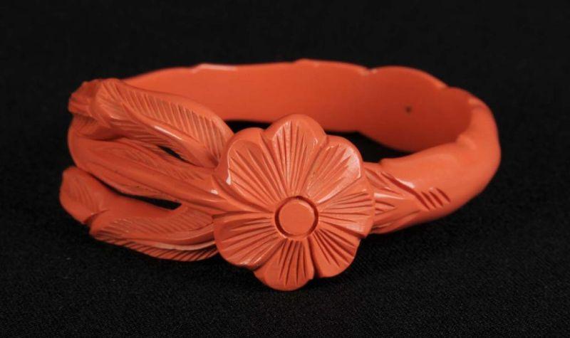 Appraisal: Bakelite Bracelet with Floral Interlocking Clasp Description Coral colored Condition