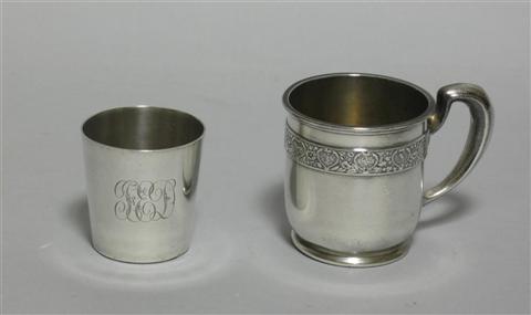 Appraisal: AN AMERICAN SILVER MUG AND A BEAKER the mug Black