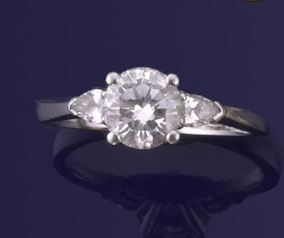 Appraisal: A diamond solitaire ring The brilliant cut diamond weighs carats