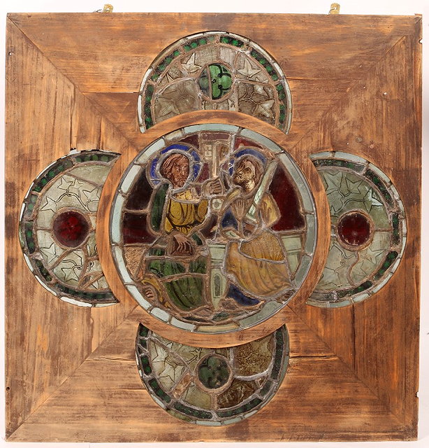 Appraisal: A FRENCH STAINED GLASS QUATREFOIL WINDOW the central circular panel