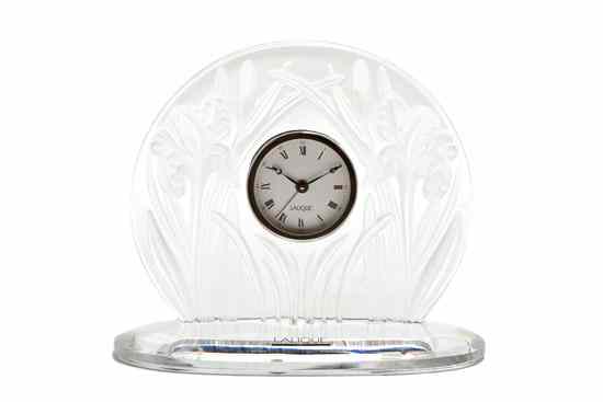 Appraisal: A Lalique Molded and Frosted Glass Table Clock Iris with