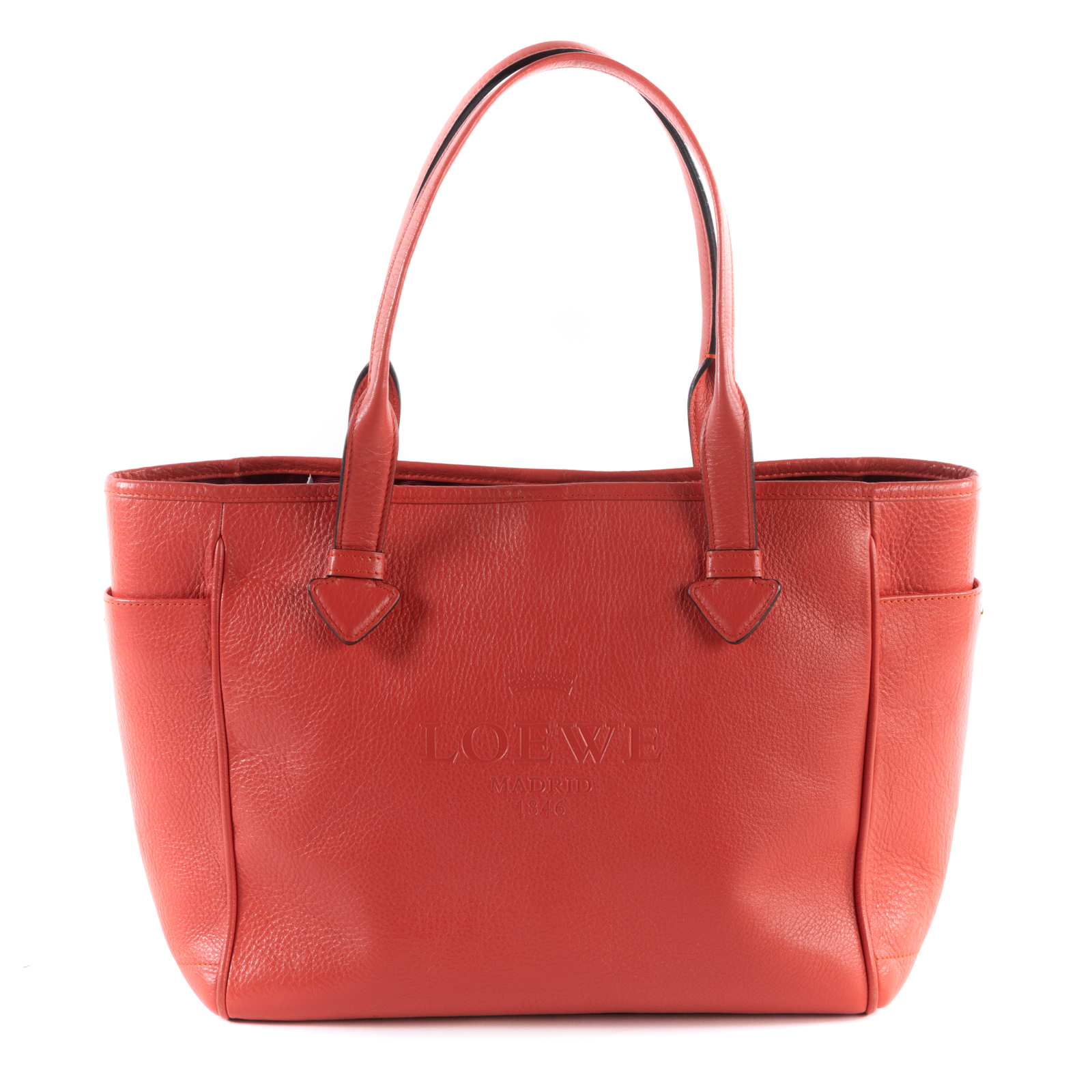 Appraisal: A LOEWE SMALL HERITAGE TOTE A red grained leather Loewe