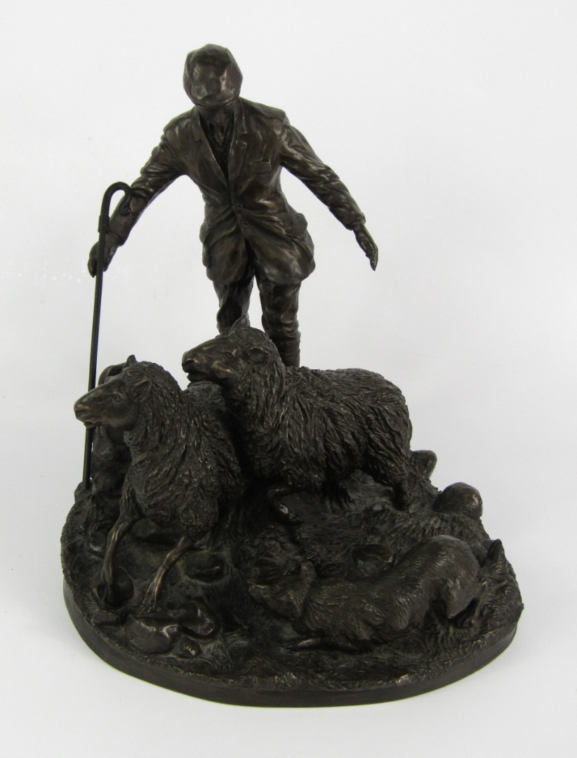 Appraisal: A Heredites bronzed sculpture of a shepherd and sheep signed