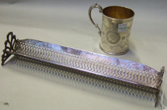 Appraisal: A Victorian silver christening mug with engraved decoration and on