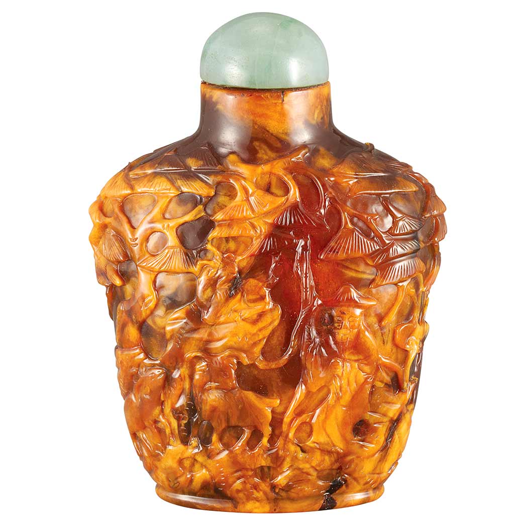 Appraisal: Chinese Amber Snuff Bottle th Century the slightly tapered shape