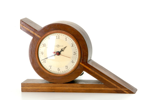 Appraisal: HERMAN MILLER Desk clock in angular wood frame with circular