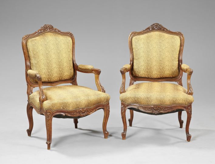 Appraisal: Pair of Louis XV-Style Fruitwood Fauteuils each with a shaped