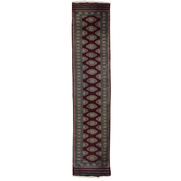 Appraisal: Pakastan Bokhara rug c geometric design on a red field