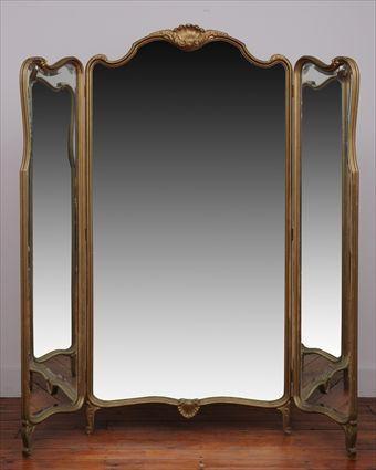 Appraisal: LOUIS XV-STYLE CARVED GILTWOOD THREE-PART DRESSING MIRROR The large center