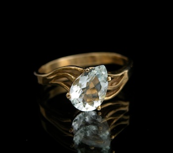 Appraisal: An Aquamarine Bypass Design Ring The ring is hallmarked k