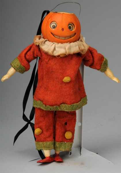 Appraisal: Composition Jack-O-Lantern with Cloth Body Description Rare Wooden hands arms