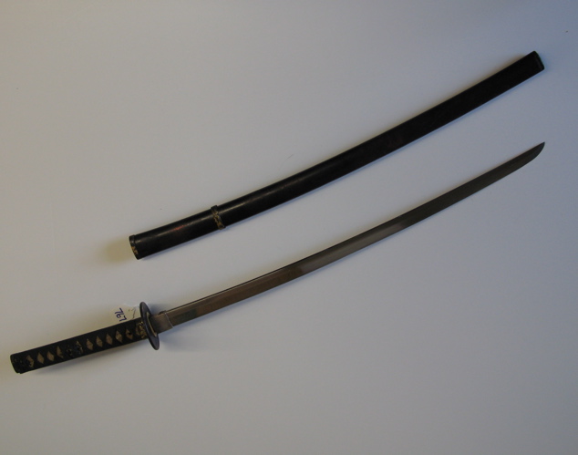 Appraisal: JAPANESE SAMURAI SWORD KATANA shallow curved blade with wavy temper