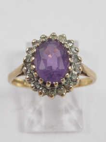 Appraisal: A hallmarked carat gold amethyst and diamond ring