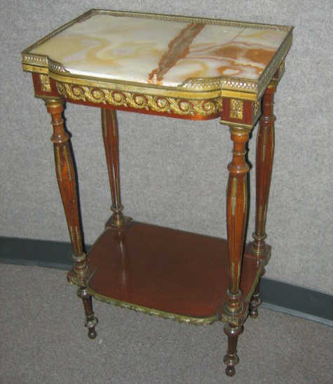 Appraisal: FRENCH GUERDIRON Two tier with inset shaped top broken with