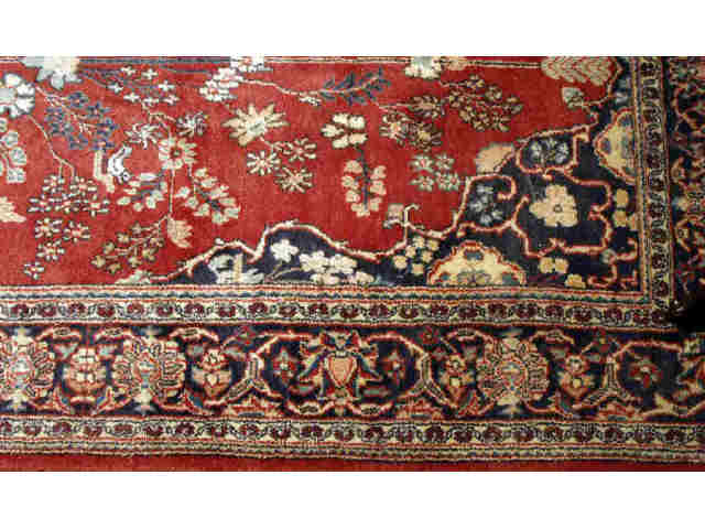 Appraisal: Hand woven tribal Persian rug measuring X Shows good condition