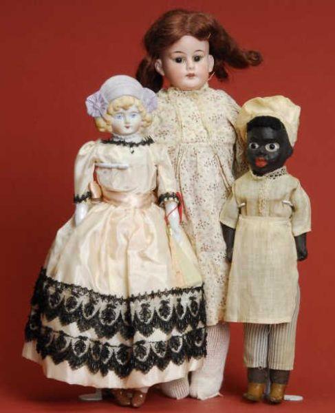 Appraisal: Lot Three German Dolls Lot includes an all original black