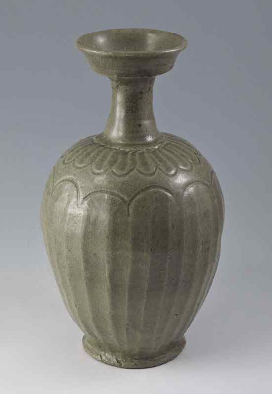 Appraisal: INCISED KOREAN GLAZED CELADON STONEWARE BOTTLE VASE Of ovoid melon