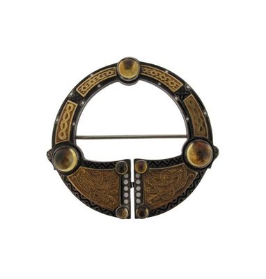 Appraisal: A Celtic design circular brooch Set in silver with gold