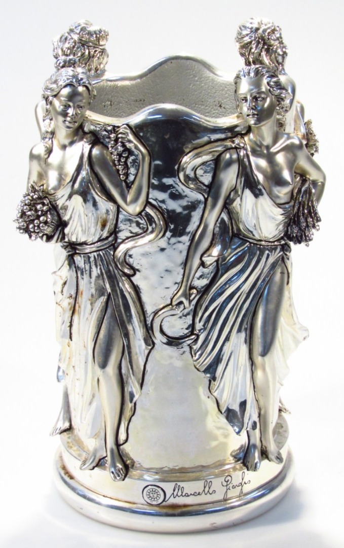 Appraisal: An Art Nouveau design jardiniere raised with ladies in flowing