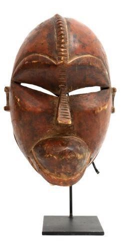 Appraisal: Large African carved mask having large slit eyes pointed nose