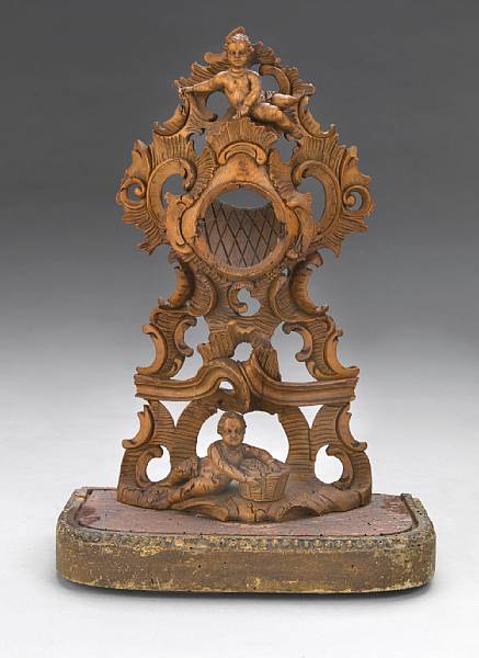 Appraisal: A Rococo carved wood watch holder mid th century height