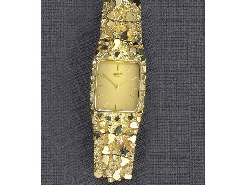 Appraisal: GOLD SEIKO yellow gold nugget bracelet on man's Seiko watch