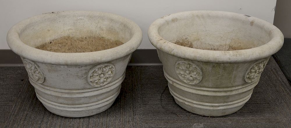 Appraisal: Pair of cement planters with leaf roset decor Provenance From