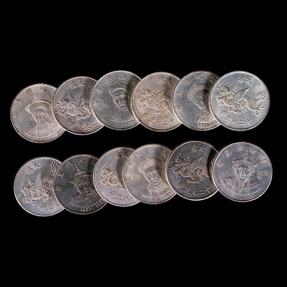 Appraisal: Twelve Chinese emperor coins Twelve late th early th century