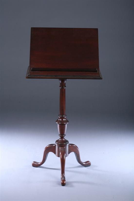 Appraisal: MAHOGANY PEDESTAL-BASE BOOKSTAND Brandt Furniture Company Rectangular top with fixed