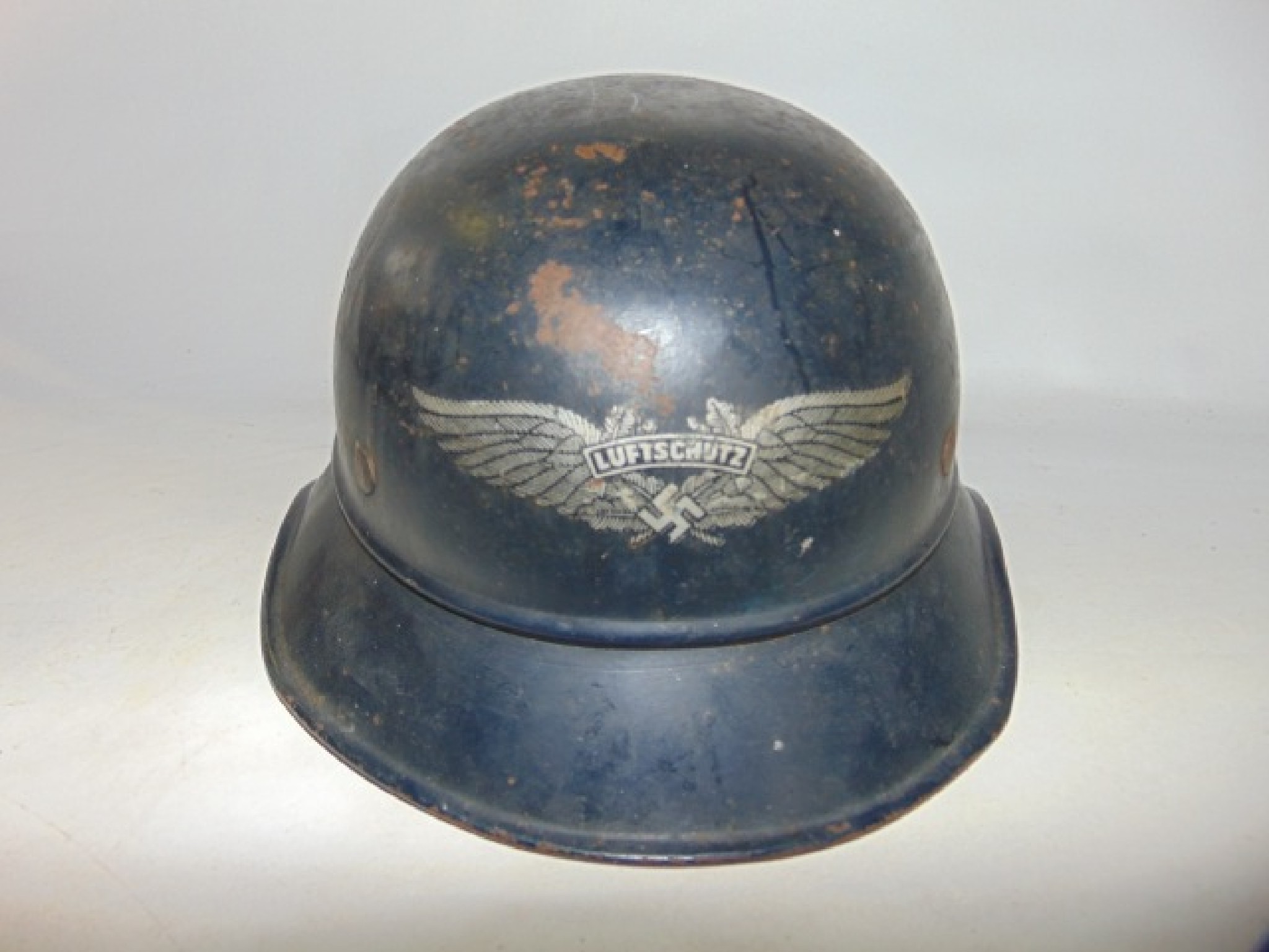 Appraisal: A German Third Reich Luftschutz helmet bearing original decal to