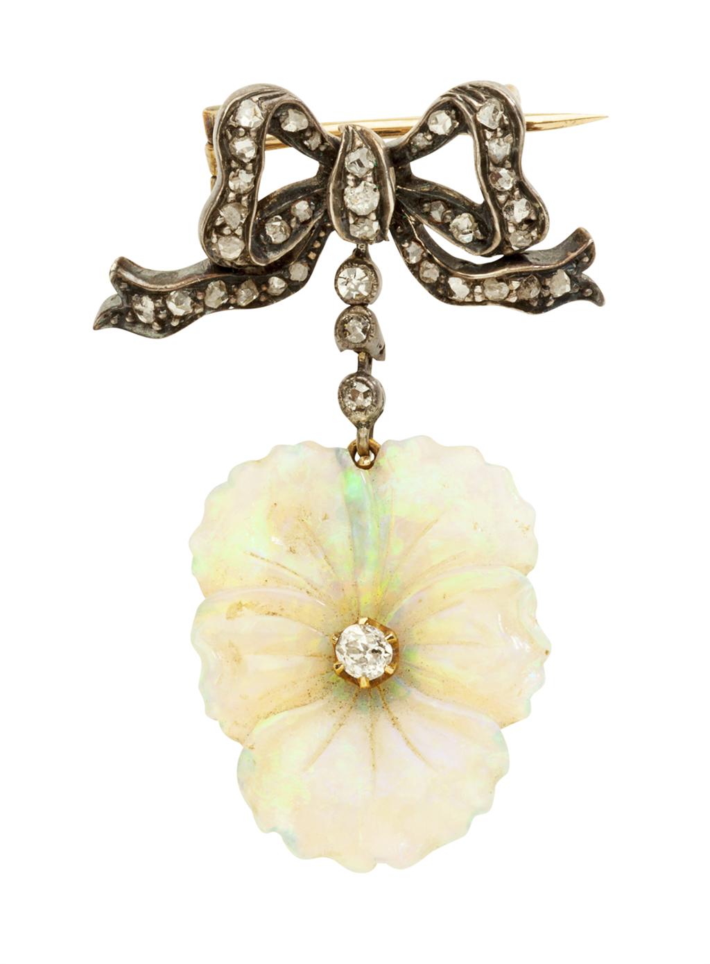 Appraisal: An opal and diamond set pendant brooch modelled as a