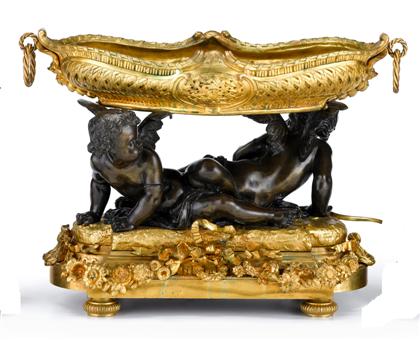 Appraisal: Louis XV style gilt patinated bronze centerpiece The shaped gilt