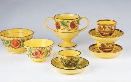 Appraisal: NINE STAFFORDSHIRE YELLOW-GROUND ENAMEL-DECORATED TRANSFER-PRINTED AND PINK LUSTRE WARES CIRCA