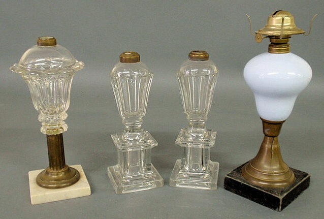 Appraisal: Pair of clear glass fluid lamps th c h and