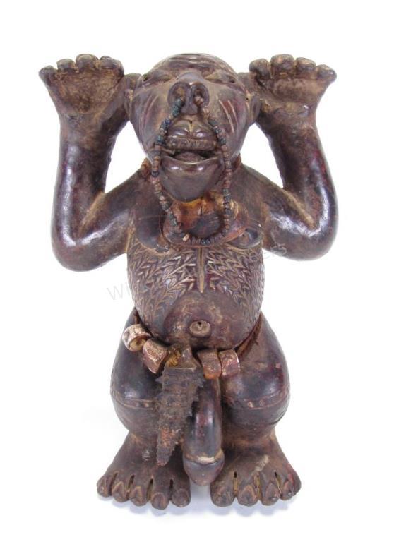 Appraisal: Carved Wooden Bieri or reliquary figure decorated with conch shell