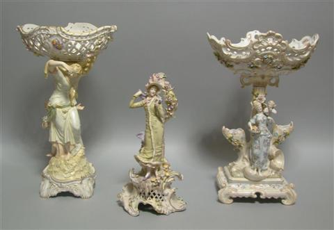 Appraisal: THREE PORCELAIN FIGURE CENTERPIECES The first German porcelain figural compote