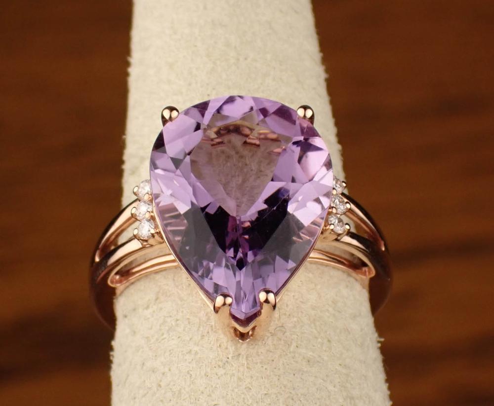 Appraisal: AMETHYST DIAMOND AND FOURTEEN KARAT GOLD RING The rose gold