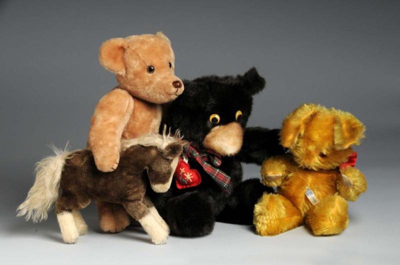 Appraisal: Lot of Stuffed Animals Description Includes one unmarked dark plush