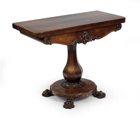 Appraisal: An early Victorian rosewood games table the rounded rectangular top