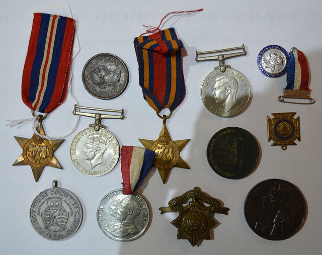 Appraisal: A group of World War II medalstogether with a bronze