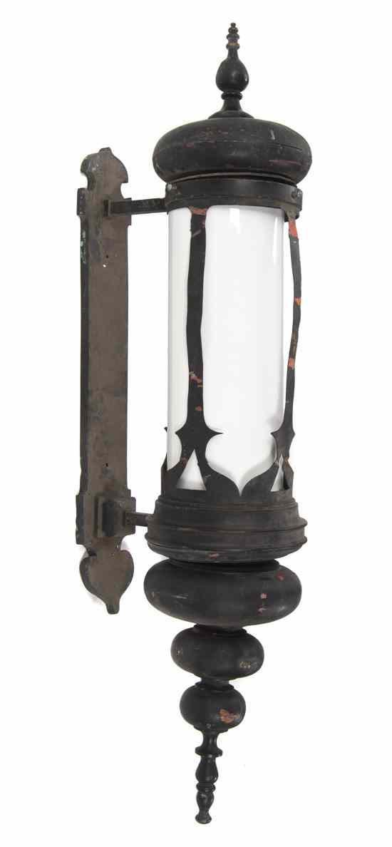 Appraisal: A Painted Copper Sconce having a shaped rectangular backplate supporting