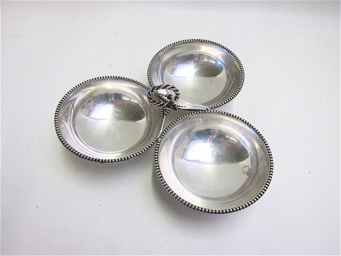 Appraisal: STERLING SILVER SERVING DISH divided into three bowls with center