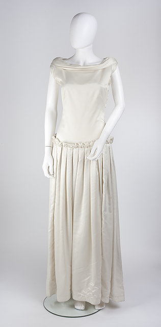 Appraisal: A s ivory silk wedding dress with boat-shaped collar small