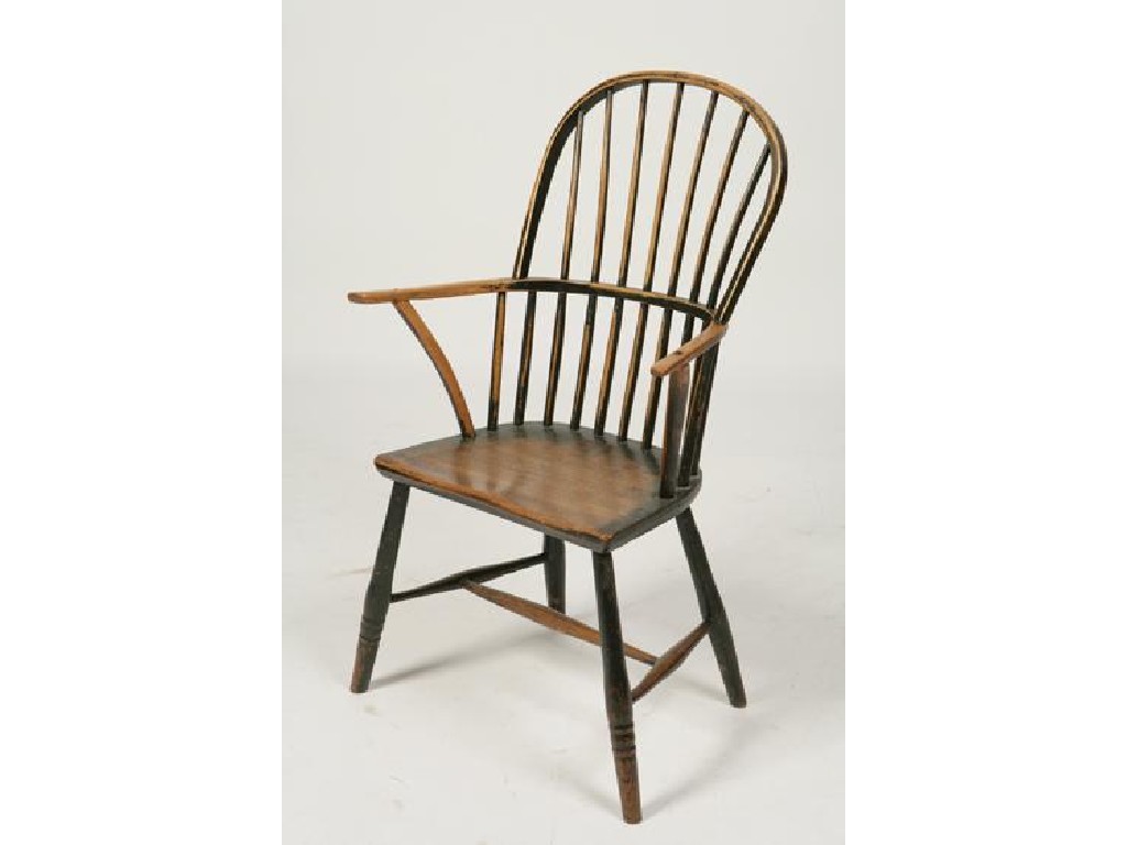 Appraisal: A CORNISH WINDSOR ARMCHAIR the hooped rail above a shaped